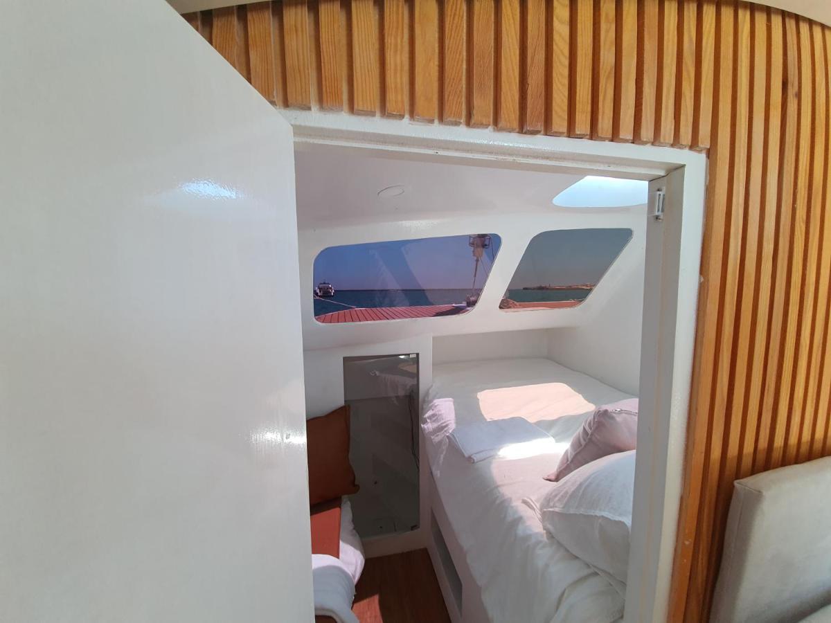 Отель Barco Casa Catamara Sleepandboat Фару Экстерьер фото