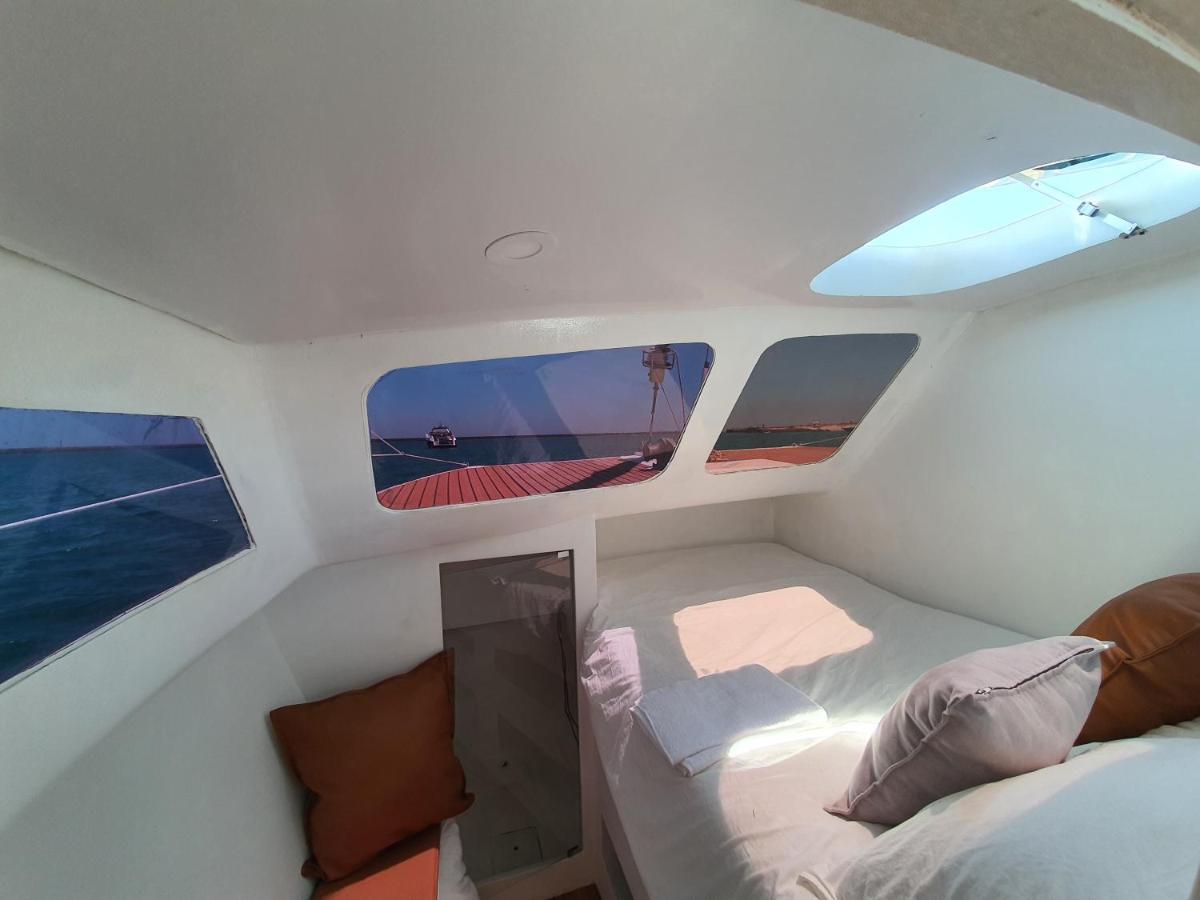 Отель Barco Casa Catamara Sleepandboat Фару Экстерьер фото