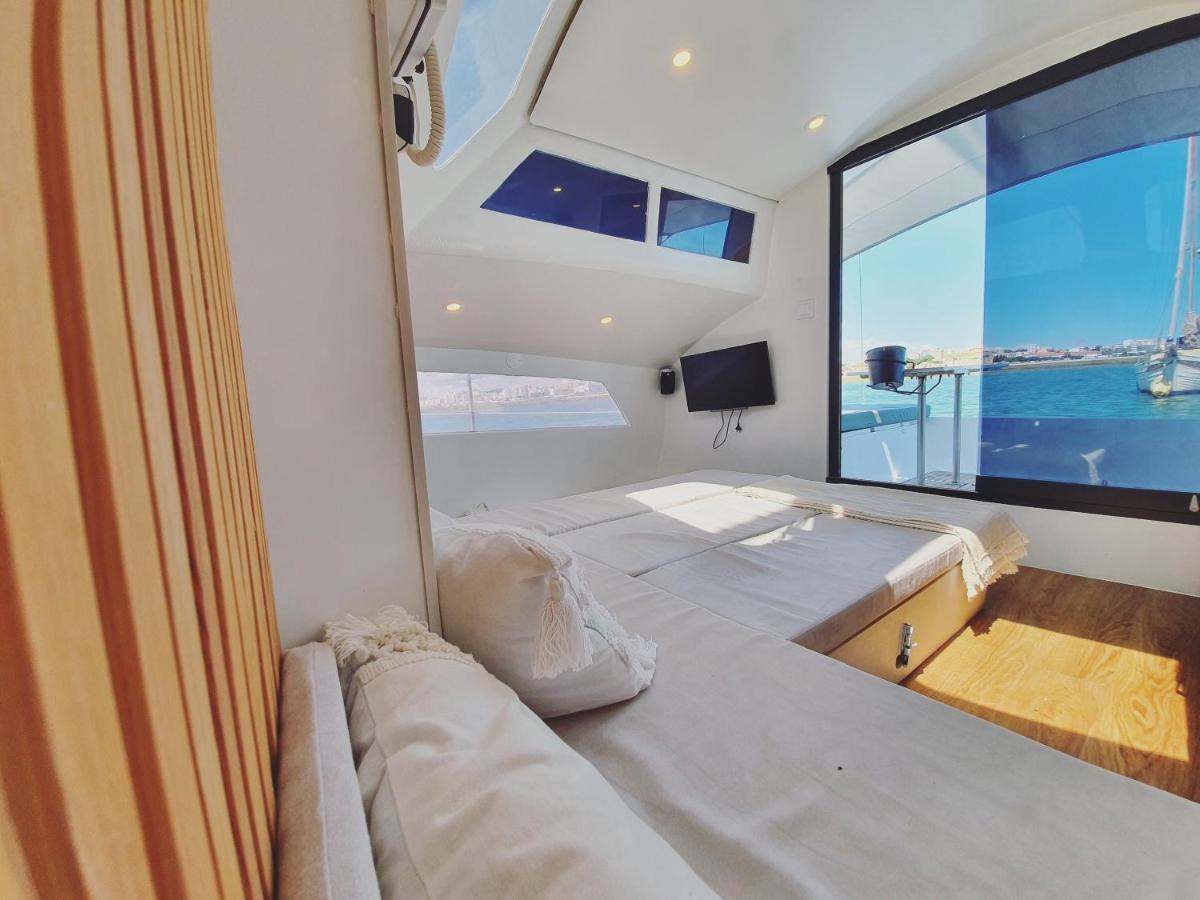 Отель Barco Casa Catamara Sleepandboat Фару Экстерьер фото