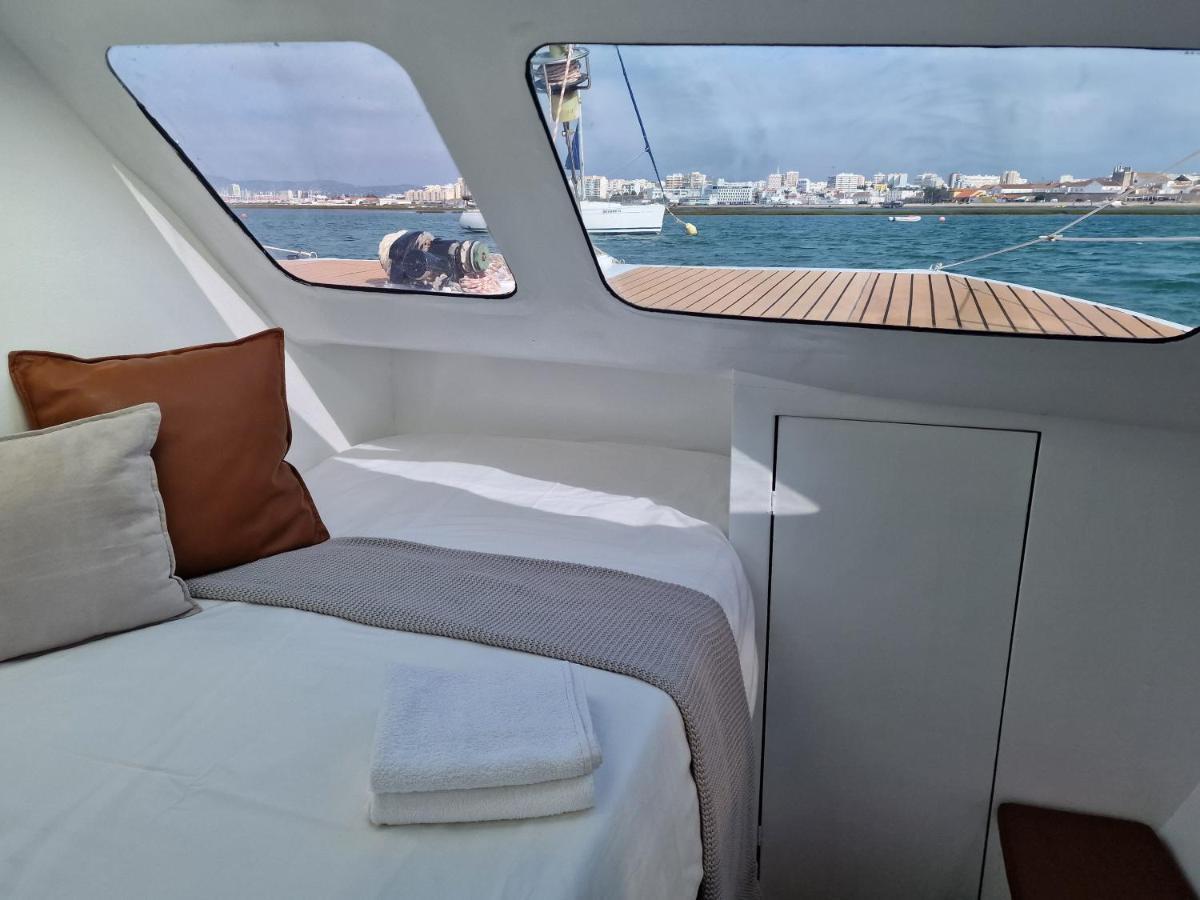 Отель Barco Casa Catamara Sleepandboat Фару Экстерьер фото